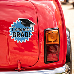 Congrats Grad graduation car magnet applied to the rear of a red car