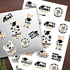 Graduation sticker sheets with multiple die cut graduation designs spread across a laptop and dark surface showing full sheet layout