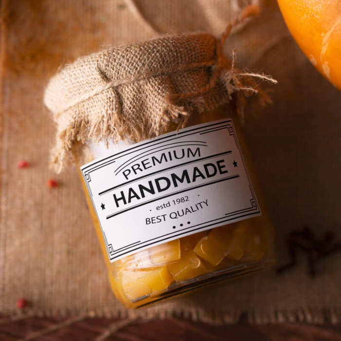 Custom rectangle sticker used as a product label on a candle