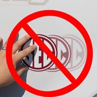 picture of magnet on a truck with a large red no-sign explaining that customers should not slide their car magnet around during application.