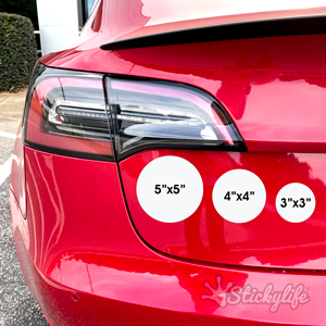 Red car with three common magnet sizes shown on the back of the car below the tail lights. 