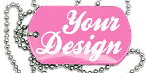 A pink military dog tag resting on a ball chain piled up on a white table. The tag reads, "Your Design".